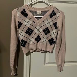 Cropped argyle print v-neck sweater from Dry Goods.